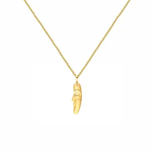 18 Karat Yellow Gold The Big Sleep Face charm pendant with diamond and sapphire