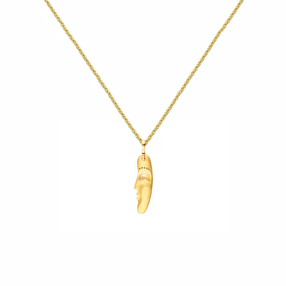 18 Karat Yellow Gold The Big Sleep Face charm pendant with diamond and sapphire