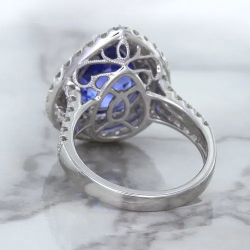 6.08ct Pear Shaped Blue Sapphire Ring with Sapphire and Diamond halo in 18K White Gold