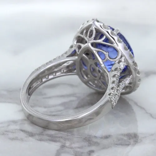 6.08ct Pear Shaped Blue Sapphire Ring with Sapphire and Diamond halo in 18K White Gold