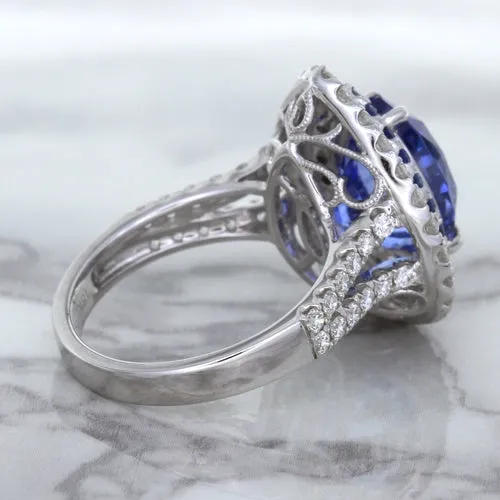 6.08ct Pear Shaped Blue Sapphire Ring with Sapphire and Diamond halo in 18K White Gold