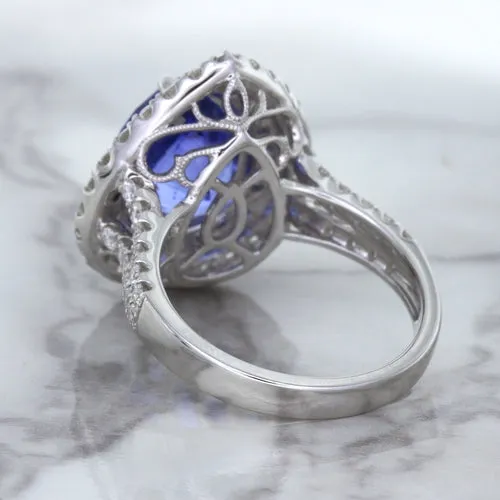 6.08ct Pear Shaped Blue Sapphire Ring with Sapphire and Diamond halo in 18K White Gold