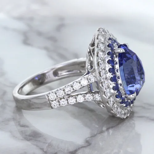 6.08ct Pear Shaped Blue Sapphire Ring with Sapphire and Diamond halo in 18K White Gold
