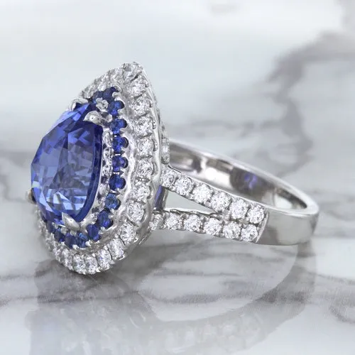 6.08ct Pear Shaped Blue Sapphire Ring with Sapphire and Diamond halo in 18K White Gold