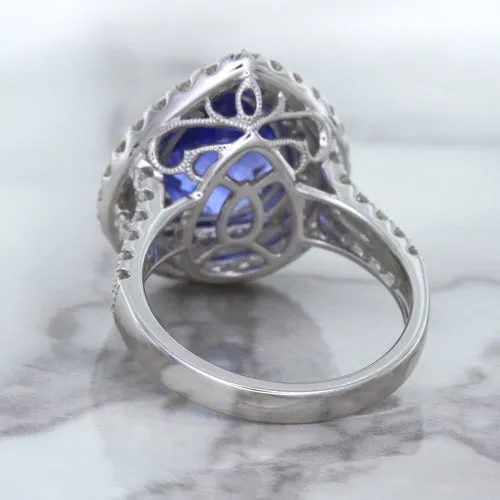 6.08ct Pear Shaped Blue Sapphire Ring with Sapphire and Diamond halo in 18K White Gold