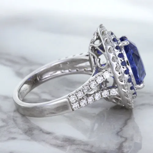 6.08ct Pear Shaped Blue Sapphire Ring with Sapphire and Diamond halo in 18K White Gold
