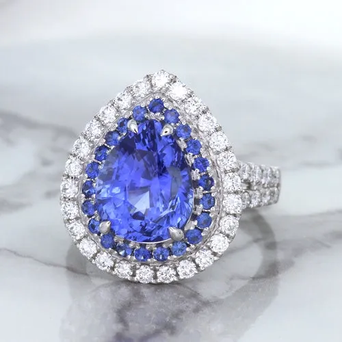 6.08ct Pear Shaped Blue Sapphire Ring with Sapphire and Diamond halo in 18K White Gold