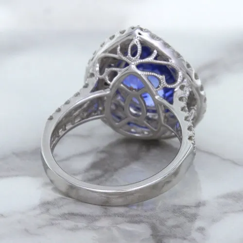 6.08ct Pear Shaped Blue Sapphire Ring with Sapphire and Diamond halo in 18K White Gold