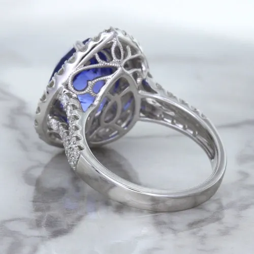 6.08ct Pear Shaped Blue Sapphire Ring with Sapphire and Diamond halo in 18K White Gold