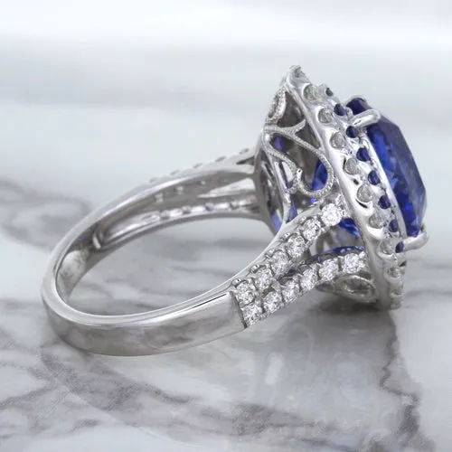 6.08ct Pear Shaped Blue Sapphire Ring with Sapphire and Diamond halo in 18K White Gold
