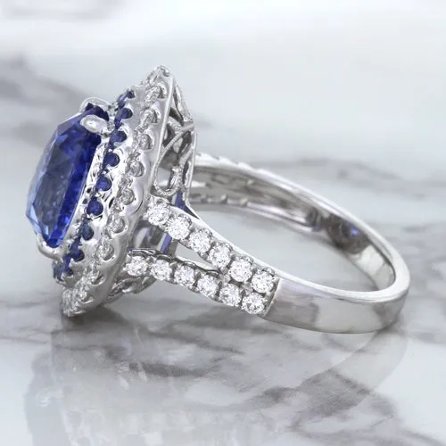 6.08ct Pear Shaped Blue Sapphire Ring with Sapphire and Diamond halo in 18K White Gold