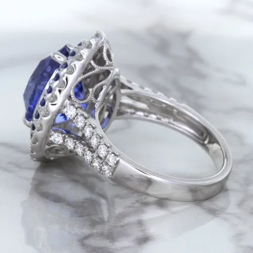 6.08ct Pear Shaped Blue Sapphire Ring with Sapphire and Diamond halo in 18K White Gold