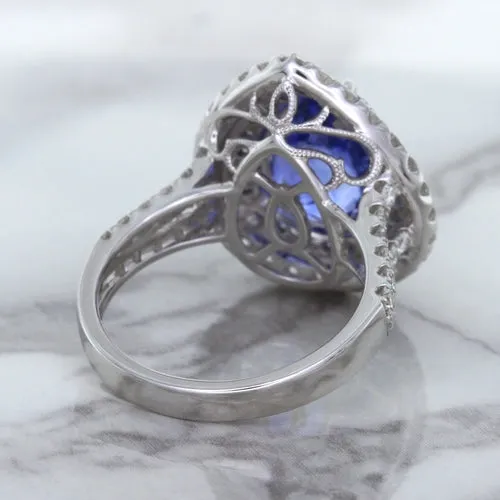 6.08ct Pear Shaped Blue Sapphire Ring with Sapphire and Diamond halo in 18K White Gold