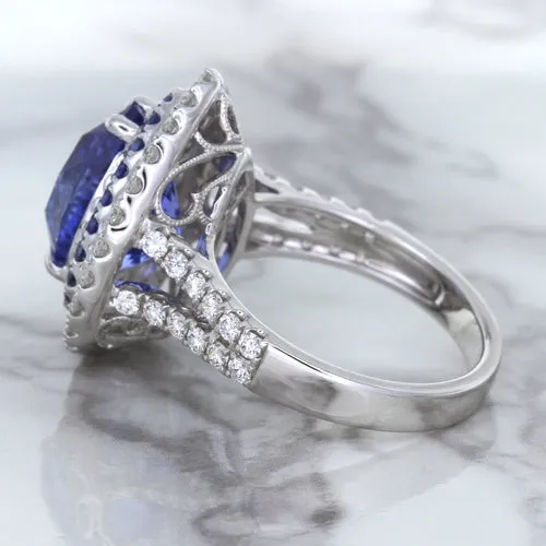 6.08ct Pear Shaped Blue Sapphire Ring with Sapphire and Diamond halo in 18K White Gold