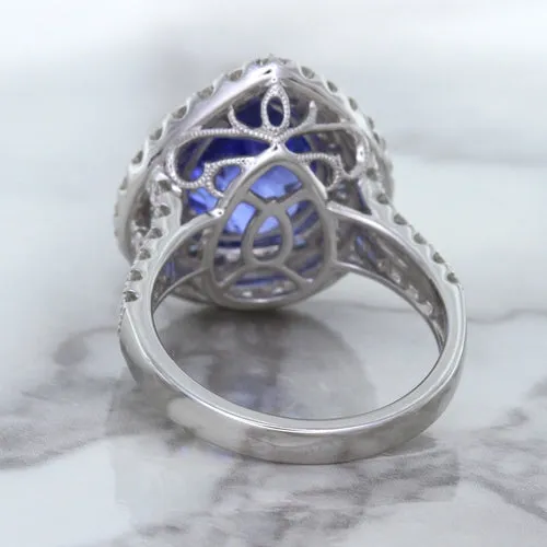 6.08ct Pear Shaped Blue Sapphire Ring with Sapphire and Diamond halo in 18K White Gold