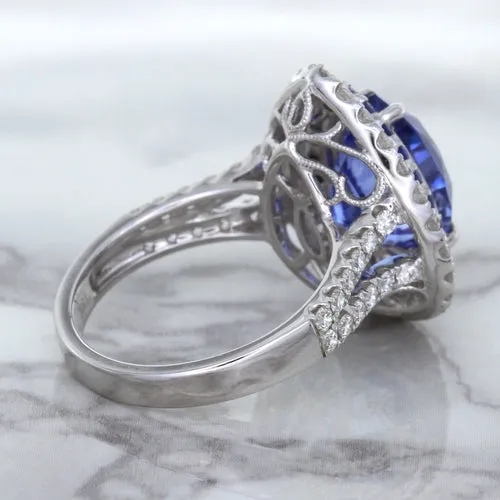 6.08ct Pear Shaped Blue Sapphire Ring with Sapphire and Diamond halo in 18K White Gold