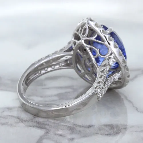 6.08ct Pear Shaped Blue Sapphire Ring with Sapphire and Diamond halo in 18K White Gold