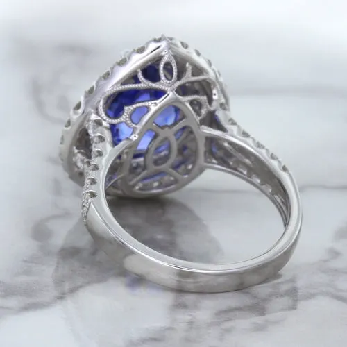 6.08ct Pear Shaped Blue Sapphire Ring with Sapphire and Diamond halo in 18K White Gold