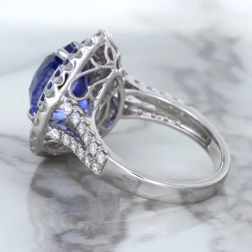 6.08ct Pear Shaped Blue Sapphire Ring with Sapphire and Diamond halo in 18K White Gold