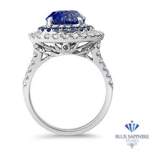 6.08ct Pear Shaped Blue Sapphire Ring with Sapphire and Diamond halo in 18K White Gold