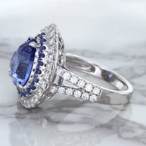 6.08ct Pear Shaped Blue Sapphire Ring with Sapphire and Diamond halo in 18K White Gold