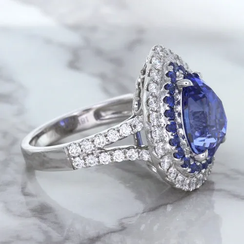 6.08ct Pear Shaped Blue Sapphire Ring with Sapphire and Diamond halo in 18K White Gold