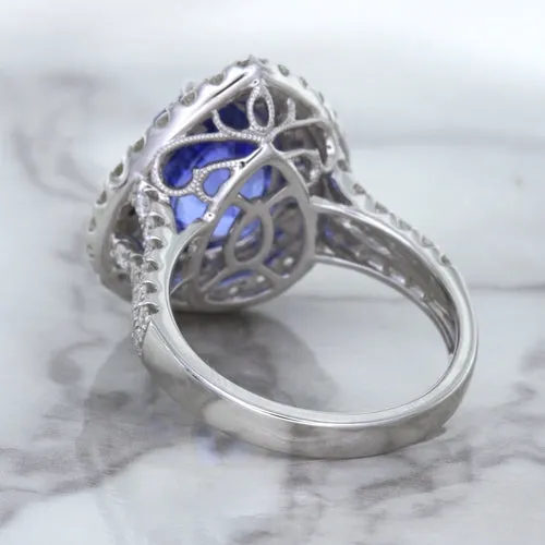 6.08ct Pear Shaped Blue Sapphire Ring with Sapphire and Diamond halo in 18K White Gold