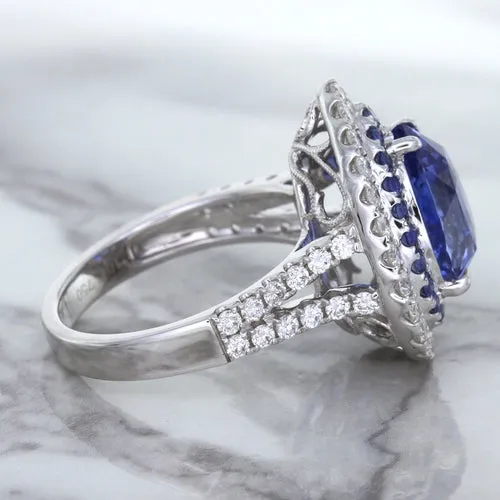 6.08ct Pear Shaped Blue Sapphire Ring with Sapphire and Diamond halo in 18K White Gold