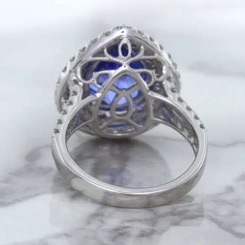 6.08ct Pear Shaped Blue Sapphire Ring with Sapphire and Diamond halo in 18K White Gold