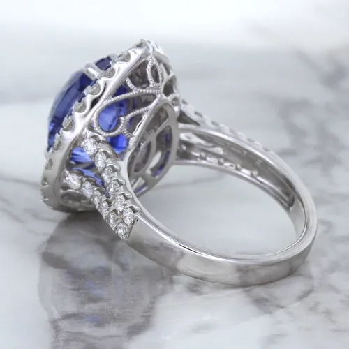 6.08ct Pear Shaped Blue Sapphire Ring with Sapphire and Diamond halo in 18K White Gold