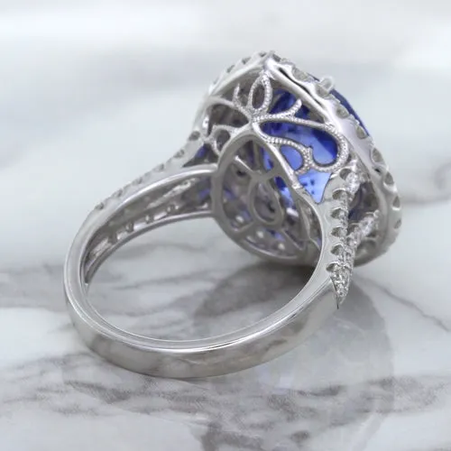 6.08ct Pear Shaped Blue Sapphire Ring with Sapphire and Diamond halo in 18K White Gold