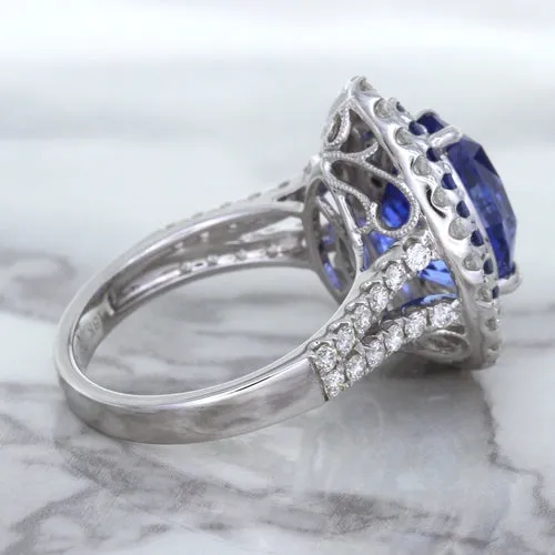 6.08ct Pear Shaped Blue Sapphire Ring with Sapphire and Diamond halo in 18K White Gold