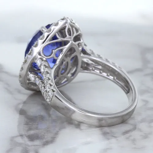 6.08ct Pear Shaped Blue Sapphire Ring with Sapphire and Diamond halo in 18K White Gold