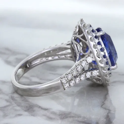 6.08ct Pear Shaped Blue Sapphire Ring with Sapphire and Diamond halo in 18K White Gold