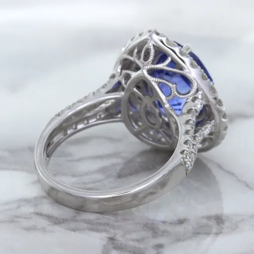 6.08ct Pear Shaped Blue Sapphire Ring with Sapphire and Diamond halo in 18K White Gold
