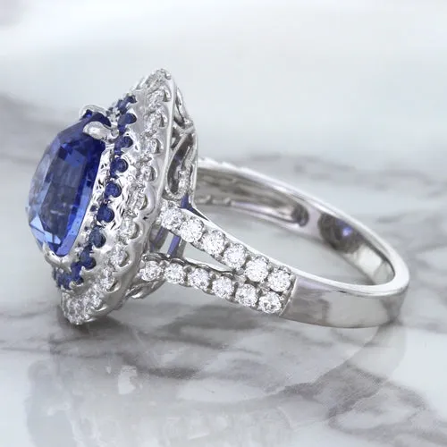 6.08ct Pear Shaped Blue Sapphire Ring with Sapphire and Diamond halo in 18K White Gold