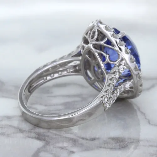 6.08ct Pear Shaped Blue Sapphire Ring with Sapphire and Diamond halo in 18K White Gold