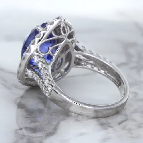 6.08ct Pear Shaped Blue Sapphire Ring with Sapphire and Diamond halo in 18K White Gold