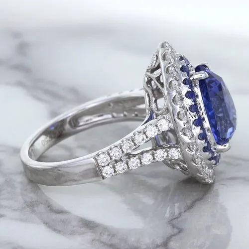 6.08ct Pear Shaped Blue Sapphire Ring with Sapphire and Diamond halo in 18K White Gold