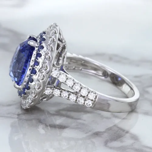 6.08ct Pear Shaped Blue Sapphire Ring with Sapphire and Diamond halo in 18K White Gold