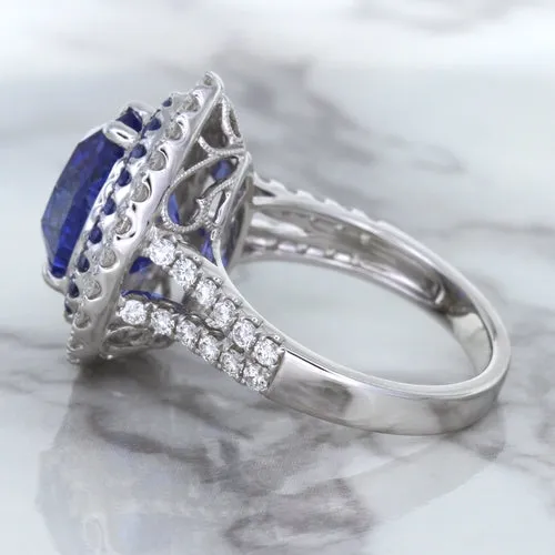 6.08ct Pear Shaped Blue Sapphire Ring with Sapphire and Diamond halo in 18K White Gold