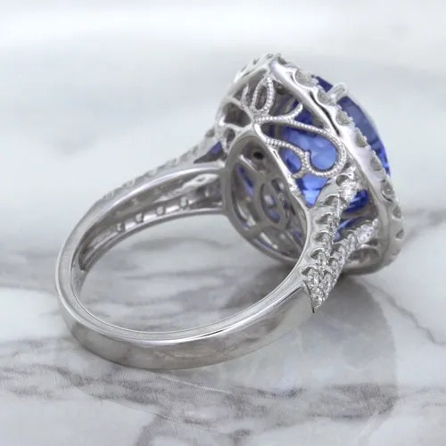 6.08ct Pear Shaped Blue Sapphire Ring with Sapphire and Diamond halo in 18K White Gold