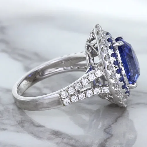 6.08ct Pear Shaped Blue Sapphire Ring with Sapphire and Diamond halo in 18K White Gold