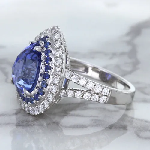 6.08ct Pear Shaped Blue Sapphire Ring with Sapphire and Diamond halo in 18K White Gold