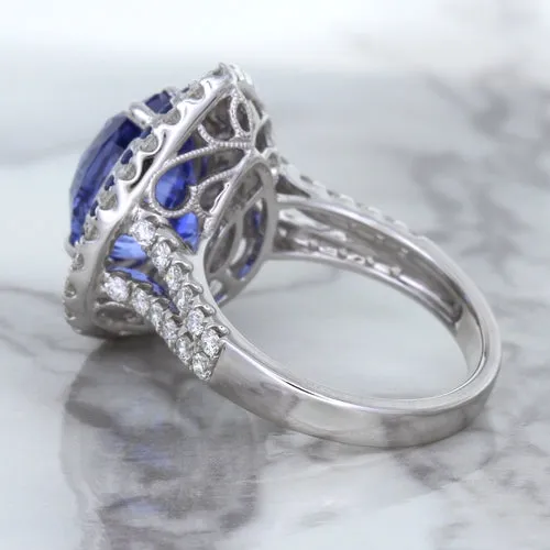 6.08ct Pear Shaped Blue Sapphire Ring with Sapphire and Diamond halo in 18K White Gold