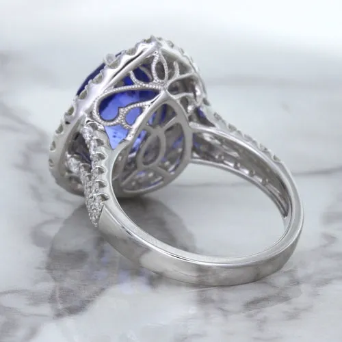 6.08ct Pear Shaped Blue Sapphire Ring with Sapphire and Diamond halo in 18K White Gold