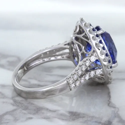 6.08ct Pear Shaped Blue Sapphire Ring with Sapphire and Diamond halo in 18K White Gold