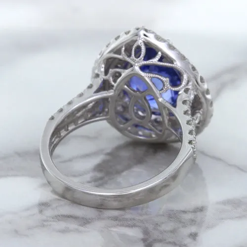 6.08ct Pear Shaped Blue Sapphire Ring with Sapphire and Diamond halo in 18K White Gold