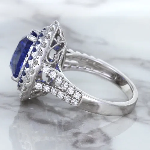 6.08ct Pear Shaped Blue Sapphire Ring with Sapphire and Diamond halo in 18K White Gold