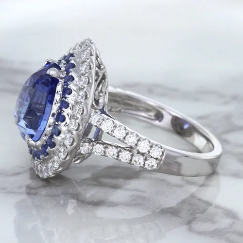 6.08ct Pear Shaped Blue Sapphire Ring with Sapphire and Diamond halo in 18K White Gold